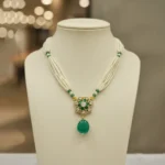 Elegant Multi-Strand Pearl and Emerald Floral Necklace